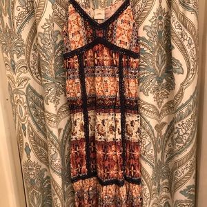 Pretty patterned dress with crochet details.